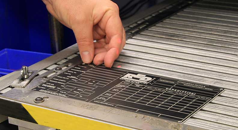 ID plate used in the manufacturing industries been removed for the laser after been laser engraved